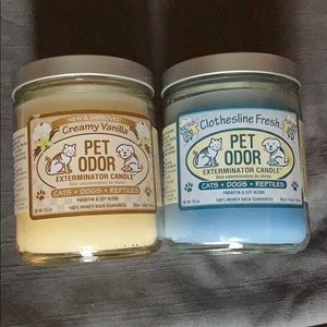Pair of scented anti-pet odor candles.